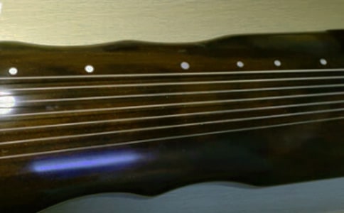 描写弹古琴人的唯美句子